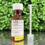 Toceranib Phosphate 50mg/mL Chicken Flavored Oral Liquid in a 60mL bottle with dosing syringe, compounded for dogs and cats.