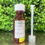 Molnupiravir Oral Liquid 50mg/mL compounded for cats in a 60mL bottle with a dosing syringe.